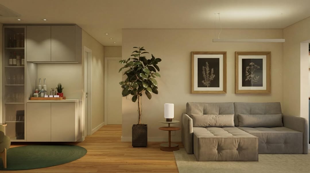 Sala de estar reformada pela EFER com acabamentos em tons neutros e iluminação natural